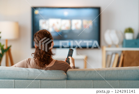Woman watching  TV 124291141