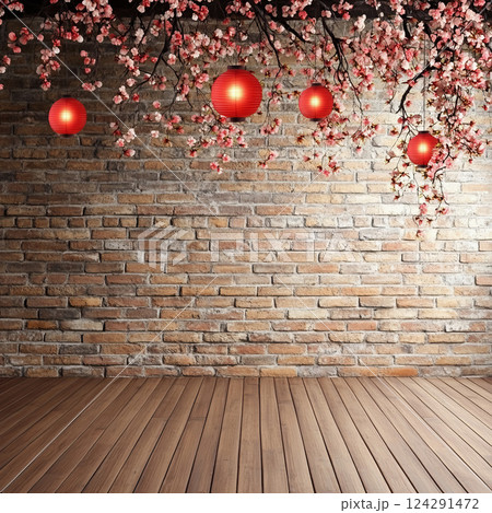 Blossoming cherry branches with red lanterns against brick wall 124291472