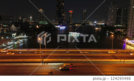 Skyscrapers in Bangkok city and river at night Skyscrapers in Bangkok city and river at night 124293498