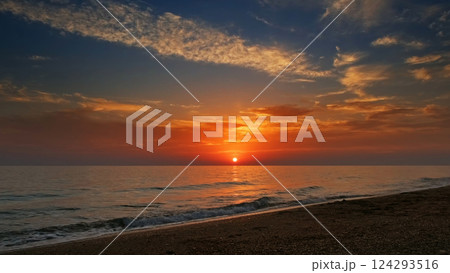 Sunset over sea with vibrant colors Sunset over sea with vibrant colors 124293516