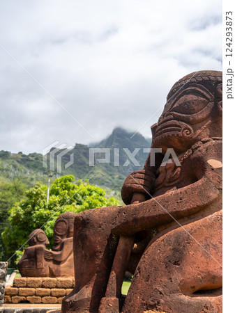 Ancient tiki statue with Mount Temetiu, Hiva Oa, French Polynesia Ancient tiki statue with Mount Temetiu, Hiva Oa, French Polynesia 124293873