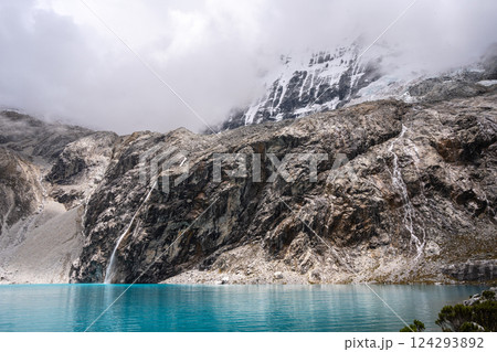 Laguna 69 with turquoise water and snowy mountains in Huaraz, Peru Laguna 69 with turquoise water and snowy mountains in Huaraz, Peru 124293892