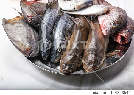 Raw fish mix for cooking 124298644