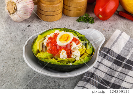 Avocado with red caviar and quil egg Avocado with red caviar and quil egg 124299135