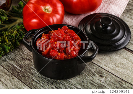 Diced ripe tomato with sauce 124299141