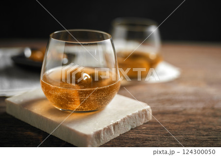 A glass of homemade Umeshu Plum Wine with soda 124300050