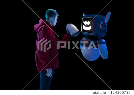 Composite image of young man interacting with 3D model of robot, demonstrating confident alliance between human and artificial intelligence. 124300755