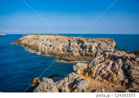View of Kape Apostolos and Kleides Islands at the very eastern tip of the Karpasia Peninsula in the Turkish Republic of Northern Cyprus. Most easterly point on mainland Cyprus. View of Kape Apostolos and Kleides Islands at the very eastern tip of the Karpasia Peninsula in the Turkish Republic of Northern Cyprus. Most easterly point on mainland Cyprus. 124301875