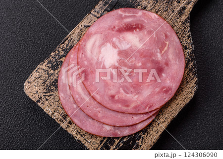Boiled ham with salt and spices cut into slices Boiled ham with salt and spices cut into slices 124306090