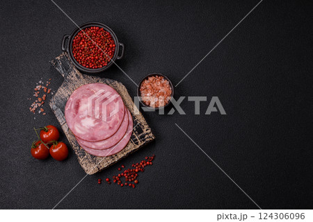 Boiled ham with salt and spices cut into slices 124306096