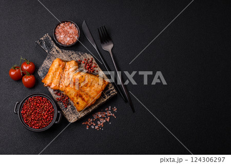 Grilled fish fillet with salt, spices and herbs 124306297