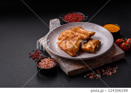 Grilled fish fillet with salt, spices and herbs Grilled fish fillet with salt, spices and herbs 124306299