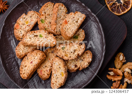 Freshly baked Italian cantuccini cookies with nuts and candied fruits Freshly baked Italian cantuccini cookies with nuts and candied fruits 124306457