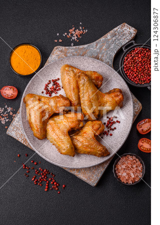 Grilled chicken wings with salt and spices 124306877