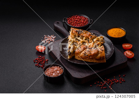 French quiche with chicken or salmon, cheese, salt, spices and herbs 124307005