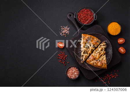 French quiche with chicken or salmon, cheese, salt, spices and herbs French quiche with chicken or salmon, cheese, salt, spices and herbs 124307006