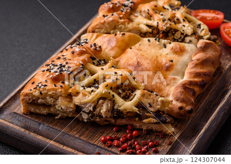 French quiche with chicken or salmon, cheese, salt, spices and herbs French quiche with chicken or salmon, cheese, salt, spices and herbs 124307044