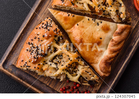 French quiche with chicken or salmon, cheese, salt, spices and herbs French quiche with chicken or salmon, cheese, salt, spices and herbs 124307045