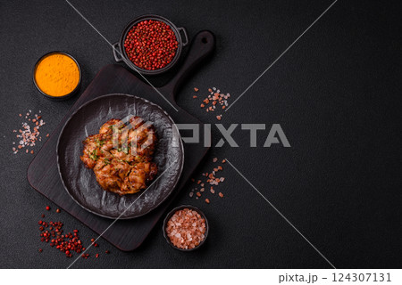 Grilled chicken fillet with garlic sauce, hot pepper Grilled chicken fillet with garlic sauce, hot pepper 124307131