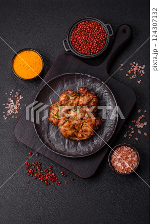 Grilled chicken fillet with garlic sauce, hot pepper Grilled chicken fillet with garlic sauce, hot pepper 124307132