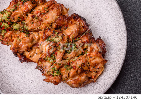 Grilled chicken fillet with garlic sauce, hot pepper Grilled chicken fillet with garlic sauce, hot pepper 124307140