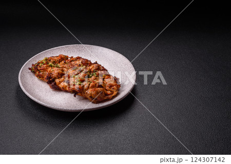 Grilled chicken fillet with garlic sauce, hot pepper Grilled chicken fillet with garlic sauce, hot pepper 124307142