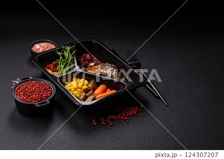 Grilled mackerel fillet pieces with vegetables, salt and spices Grilled mackerel fillet pieces with vegetables, salt and spices 124307207