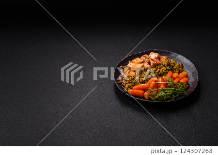 Quinoa bowl with tofu, steamed vegetables, grains, seeds and spices Quinoa bowl with tofu, steamed vegetables, grains, seeds and spices 124307268