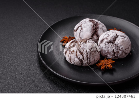 Delicious round freshly baked chocolate flavored cookies 124307463
