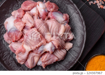Raw chicken or turkey stomach with salt, spices and herbs Raw chicken or turkey stomach with salt, spices and herbs 124307967
