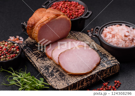 Meat, smoked, ham sliced with salt, spices and herbs 124308296