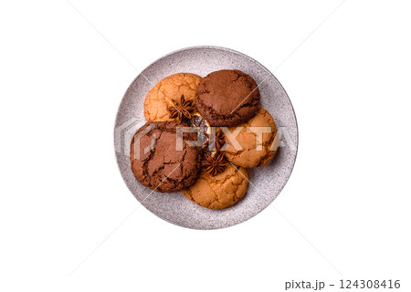 Sweet round crispy chocolate chip cookies Sweet round crispy chocolate chip cookies 124308416