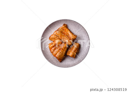 Grilled fish fillet with salt, spices and herbs 124308519