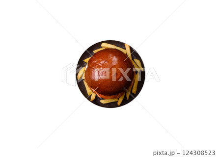 Delicious burger with beef patty, fried egg, bacon, herbs, sauce, salt and spices Delicious burger with beef patty, fried egg, bacon, herbs, sauce, salt and spices 124308523