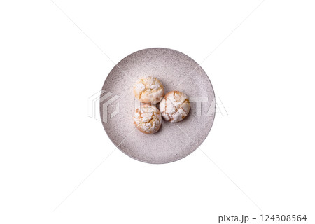 Delicious round freshly baked lemon flavored cookies Delicious round freshly baked lemon flavored cookies 124308564
