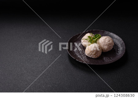 Delicious healthy steamed chicken cutlets or minced meatballs 124308630
