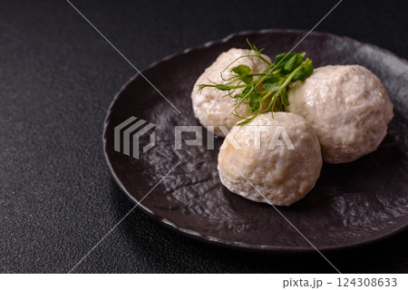 Delicious healthy steamed chicken cutlets or minced meatballs 124308633