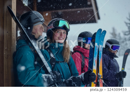 A group of young skiers enjoying a snowy day in the mountains. They are prepared for adventure with their gear. The joy of winter sports is evident. Generative AI 124309459