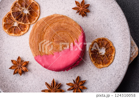 Round sweet New York roll croissant with raspberry cream filling 124310058