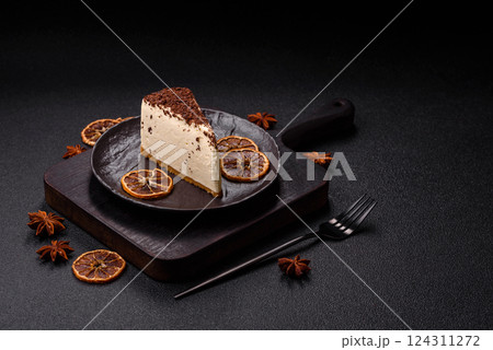 Delicious sweet piece of cheesecake with mascarpone cheese 124311272