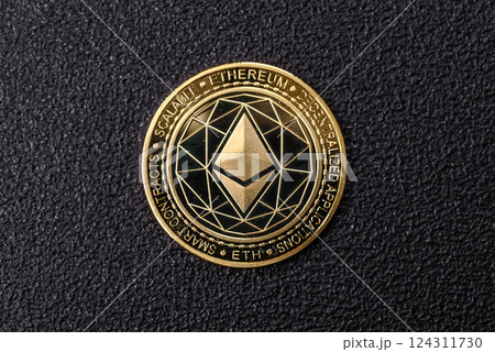 Ethereum cryptocurrency dummy in the form of a round iron coin Ethereum cryptocurrency dummy in the form of a round iron coin 124311730