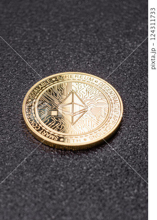 Ethereum cryptocurrency dummy in the form of a round iron coin Ethereum cryptocurrency dummy in the form of a round iron coin 124311733