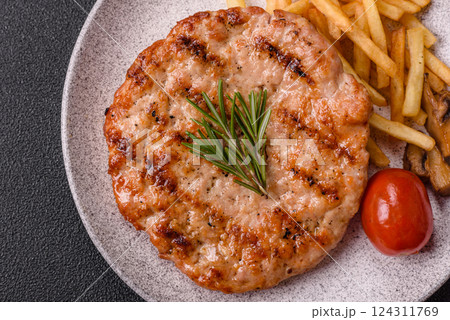Delicious fresh grilled turkey fillet with spices and herbs 124311769
