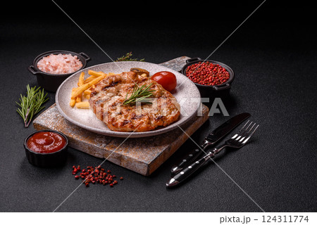Delicious fresh grilled turkey fillet with spices and herbs Delicious fresh grilled turkey fillet with spices and herbs 124311774