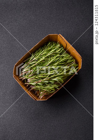 Fresh green rosemary sprigs prepared for cooking 124311815