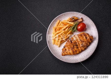 Delicious fresh grilled chicken fillet with spices and herbs 124311890