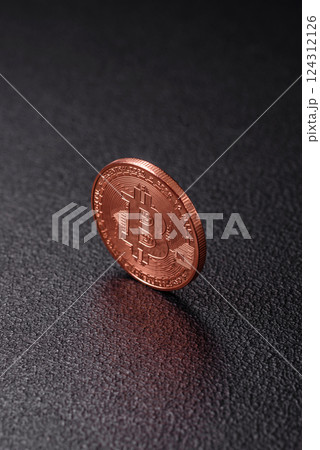 Bitcoin cryptocurrency dummy in the form of a round iron coin 124312126