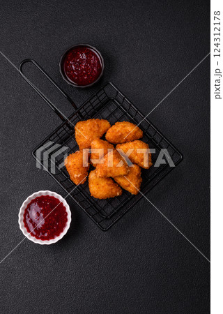Brie cheese or camembert fries in breading, fast food, takeaway 124312178