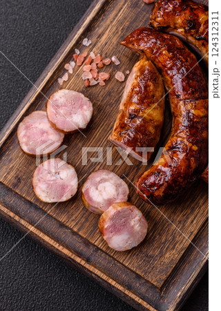 Delicious sausage with salt, spices and herbs 124312311
