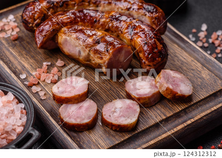 Delicious sausage with salt, spices and herbs 124312312